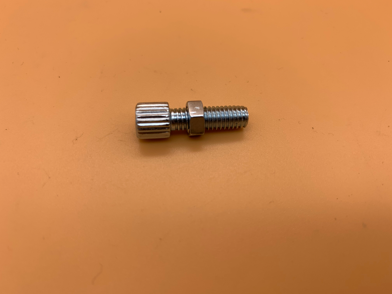 Skrutka nastavovania lanka s matkou/Cable adjustment screw with nut Image